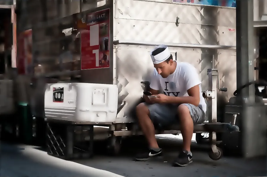 Anisotropic Diffusion, applied to “Man sitting on food truck (Unsplash)”