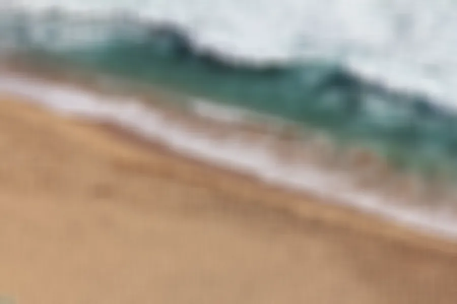 Box Blur, applied to “Ocean washing on the beach (Unsplash)”