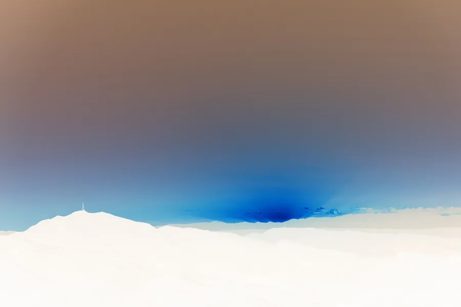 Color Inversion, applied to “Sunset with mountain landscape. (Unsplash)”