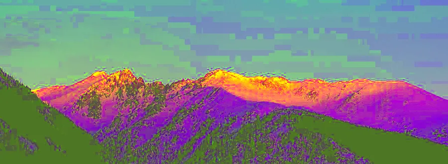 Decorrelation Stretch, applied to “Red sunset on a mountain (Unsplash)”