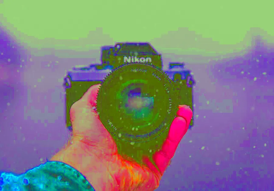 Decorrelation Stretch, applied to “Nikon In The Snow (Unsplash)”