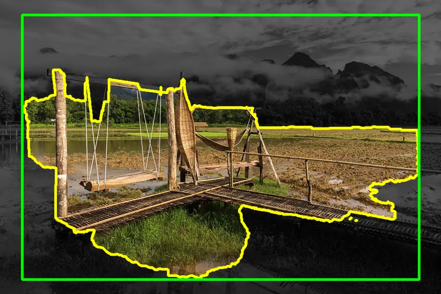 GrabCut Mask, applied to “Wooden bench swing and wicker hammocks on a bamboo footbridge in paddy fields a ”