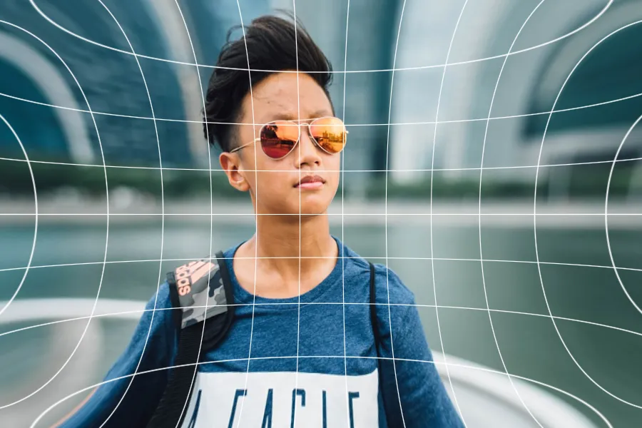 Pincushion Distortion, applied to “Man with skyscrapers and river (Unsplash)”