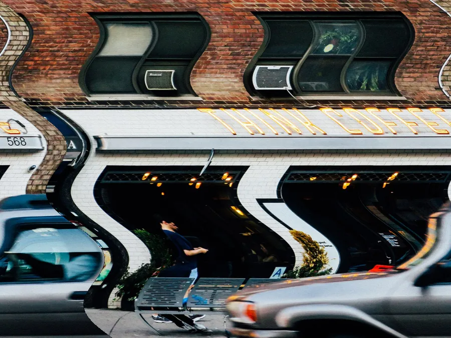 Rolling Shutter Wobble, applied to “Yellow Think Coffee neon (Unsplash)”