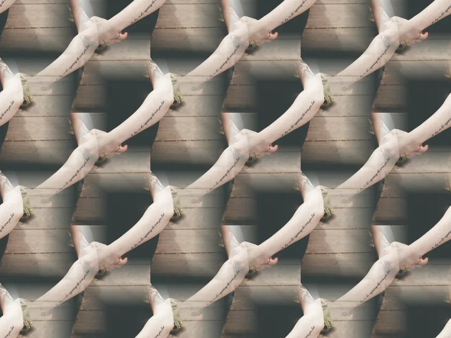 Seamless Tiling, applied to “Woman sitting on wooden dock (Unsplash)”